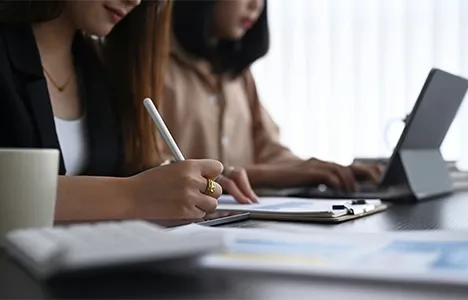 Business partners working together at a desk